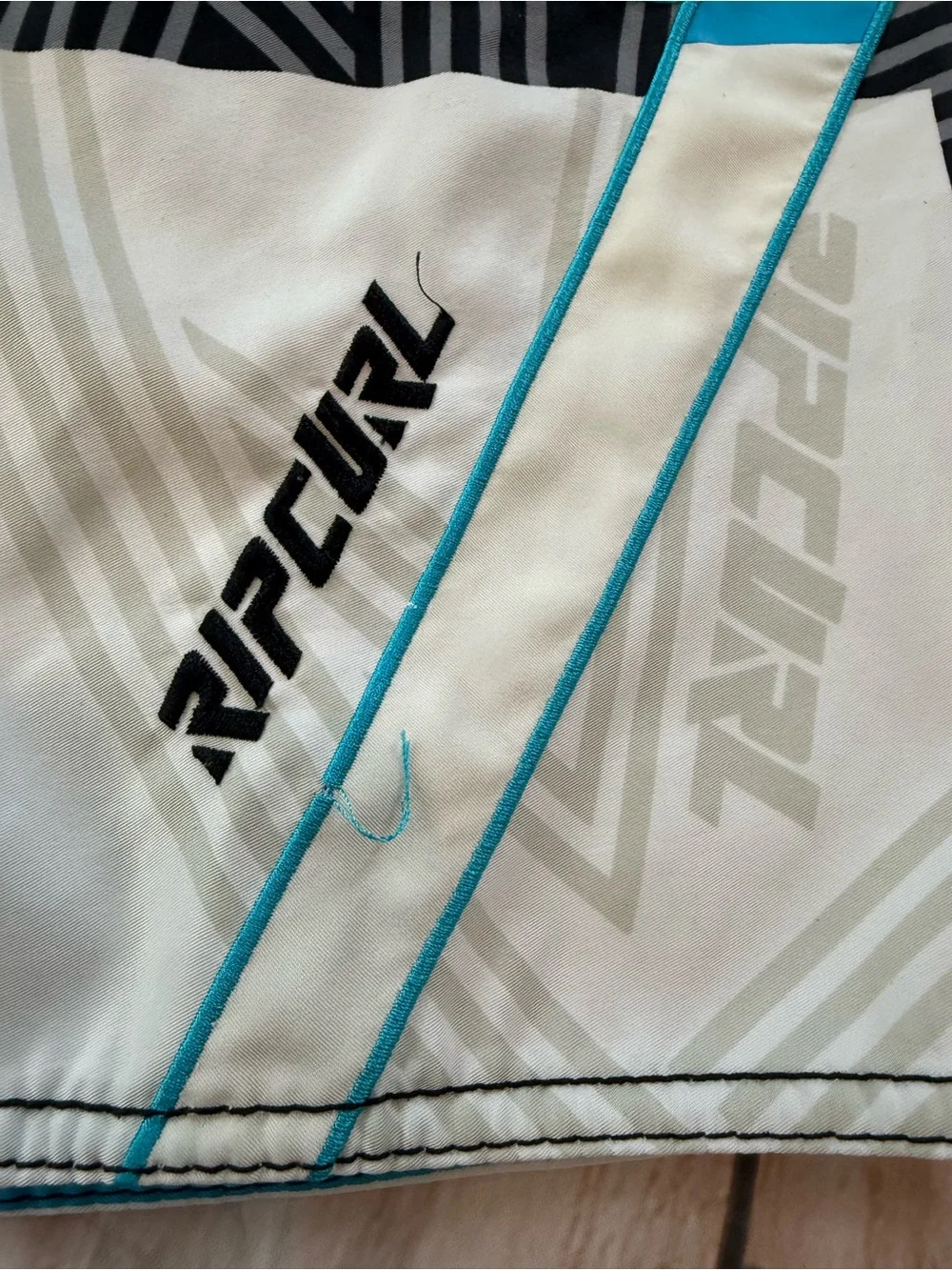 Vintage Y2K RipCurl White Black Blue Lighting Bolt Board Shorts. Size 31